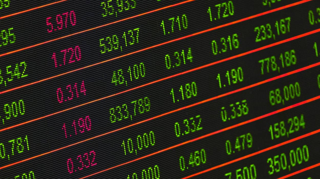 This is an image of a blackboard with dynamic pricing figures in colors